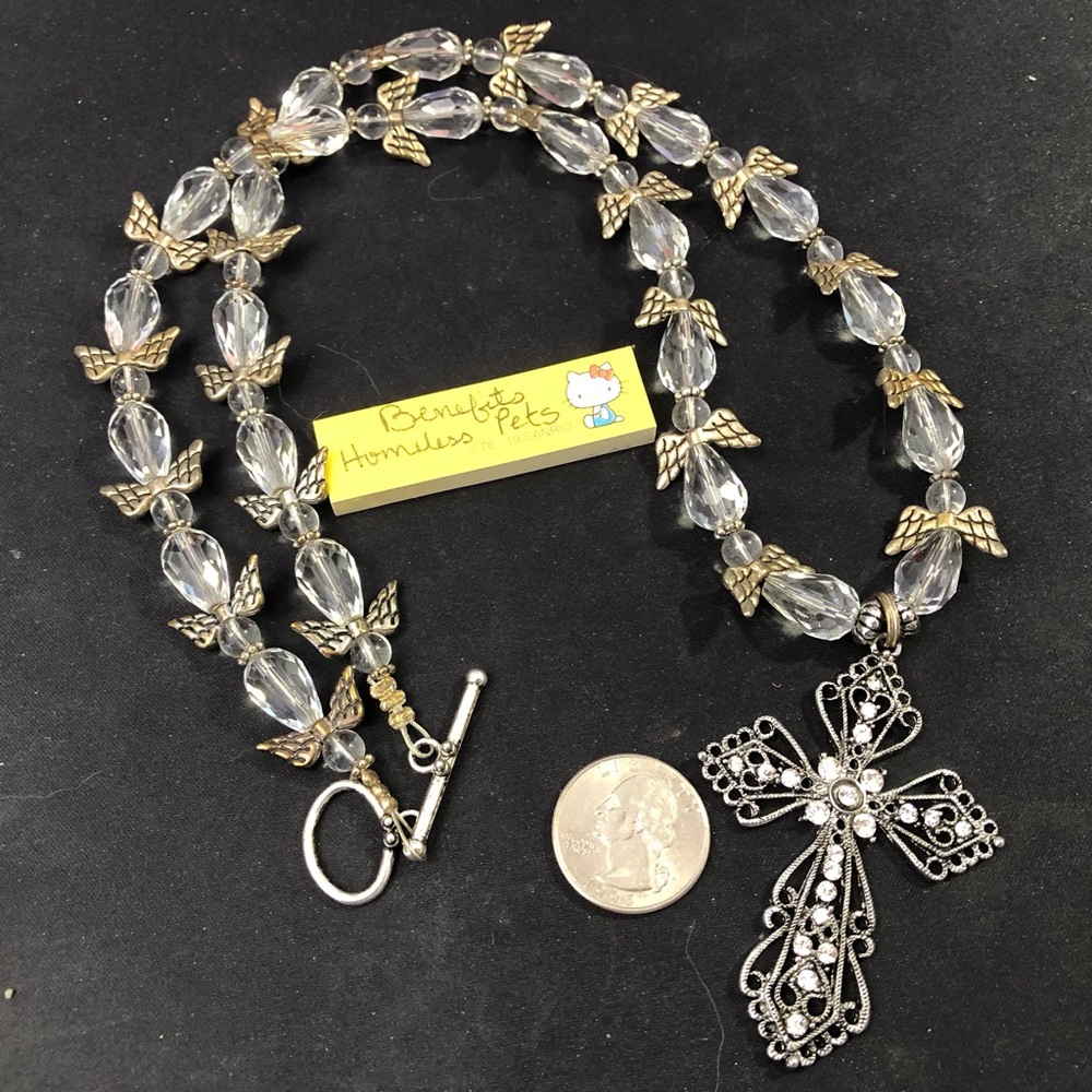 STUNNING hand strung crystal angels and cross necklace.